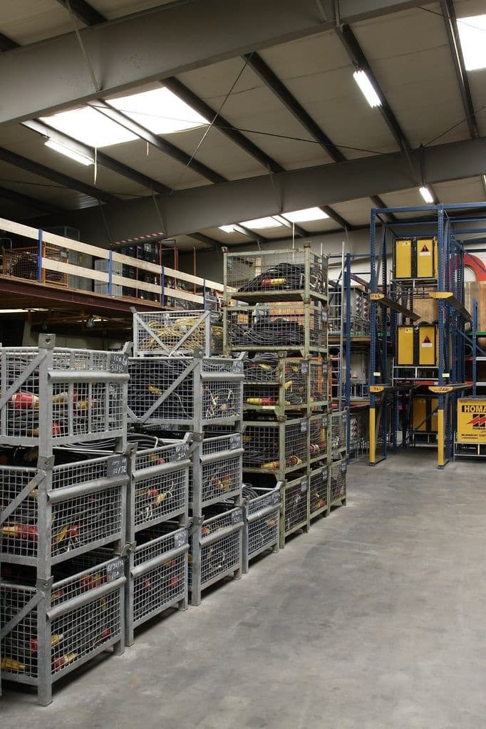 Homan warehouse with stock of cables and equipment